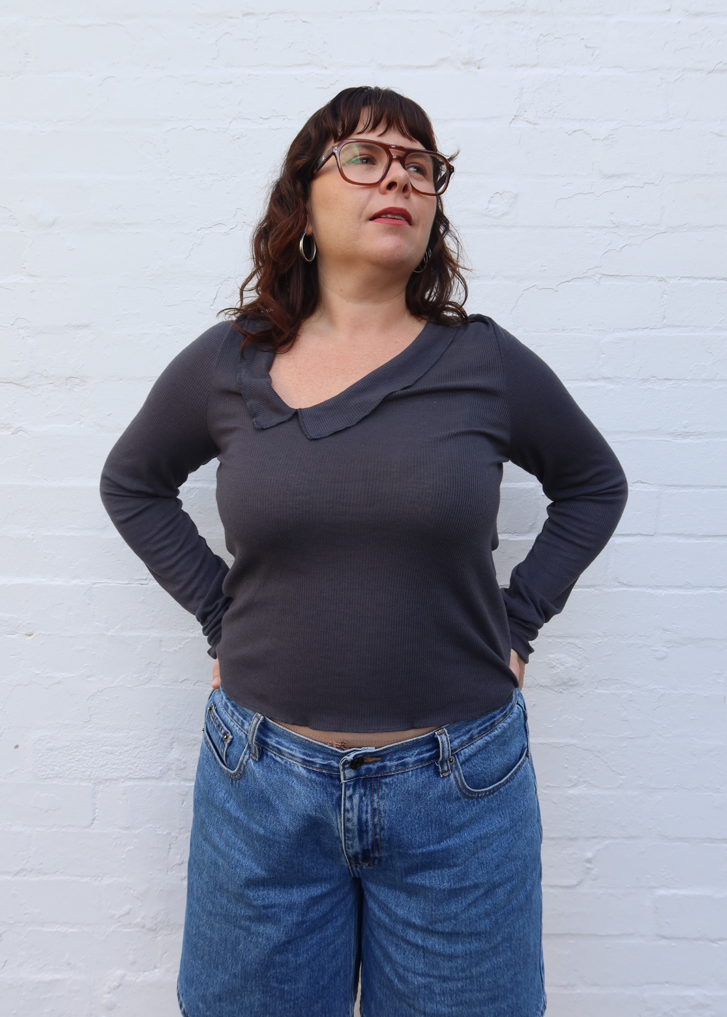 DEIJI STUDIOS Rib Knit Ruffle Neck Asymmetric Top