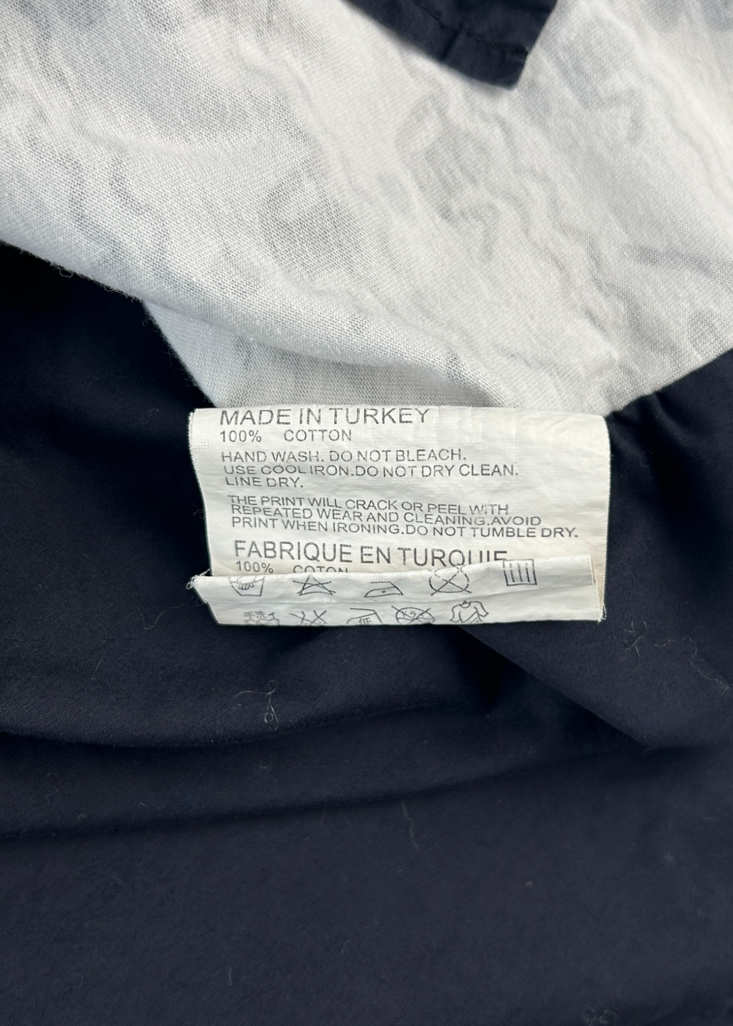 COMME DES GARCONS SHIRT Swimming Figure Print Shirt