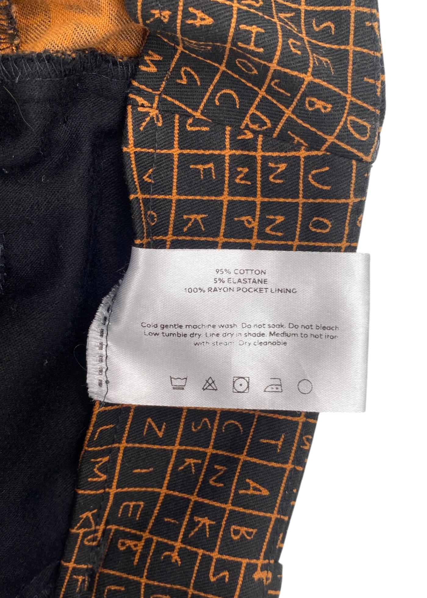 ARTHUR APPAREL Black/Orange Find-A-Word Grid Print Pants